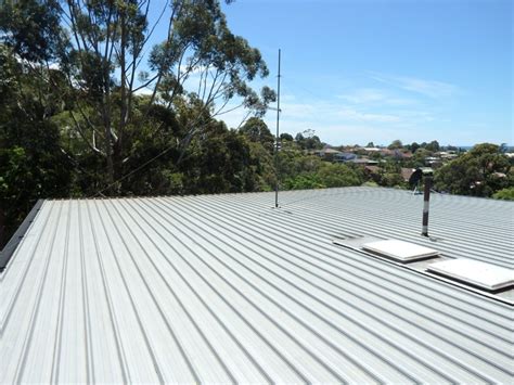 flat metal house roof|best residential flat roof material.